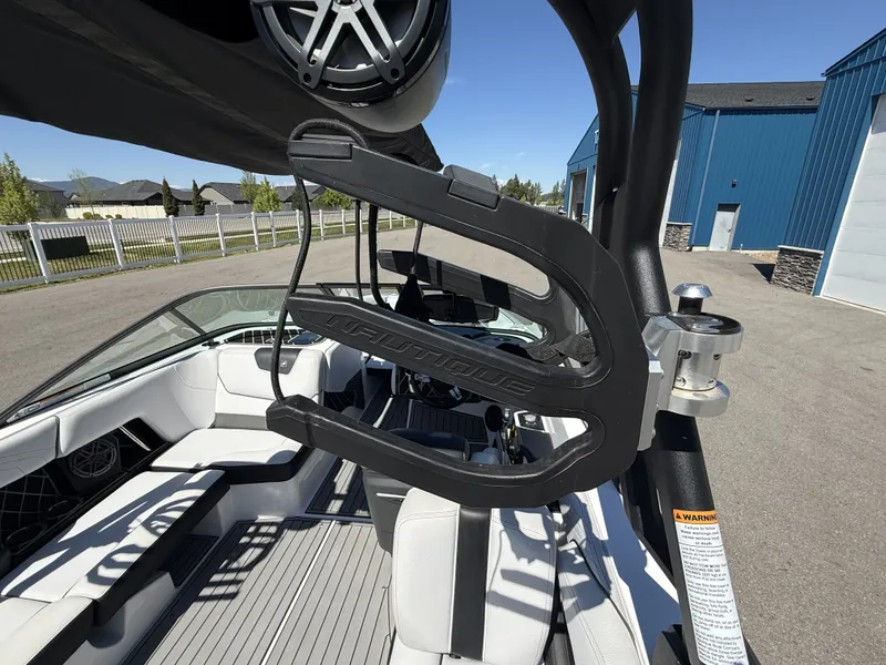 Slide: The Image of 2018 Nautique Super Air Nautique GS22 interior and speaker view. - 18