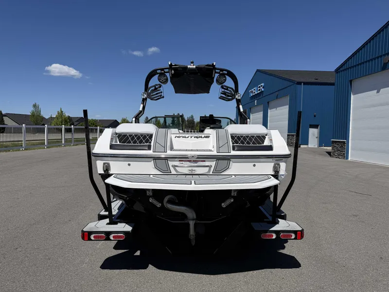 Slide: The Image of Rear view of a 2018 Nautique Super Air Nautique GS22 boat. - 7