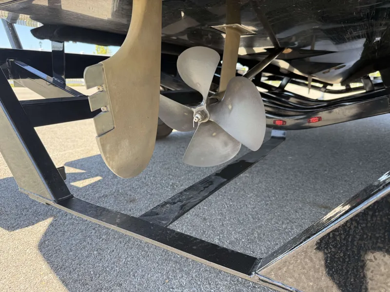 Slide: The Image of Underside of a 2018 Nautique Super Air Nautique GS22 boat with propeller. - 8