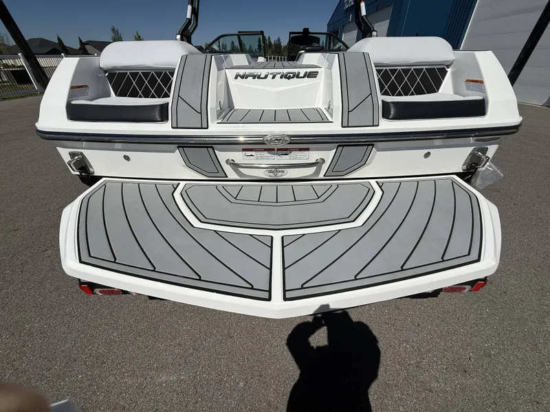 Slide: The Image of Rear view of a 2018 Nautique Super Air Nautique GS22 boat. - 9