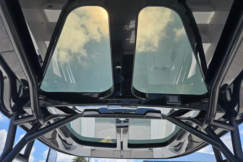 Slide: The Image of Glass roof of Navan S30 2026 with sky reflection. - 21