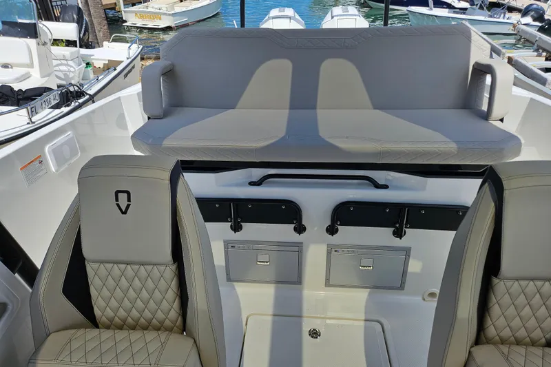 Slide: The Image of Interior of Navan S30 boat, 2026 model, featuring gray seating. - 26
