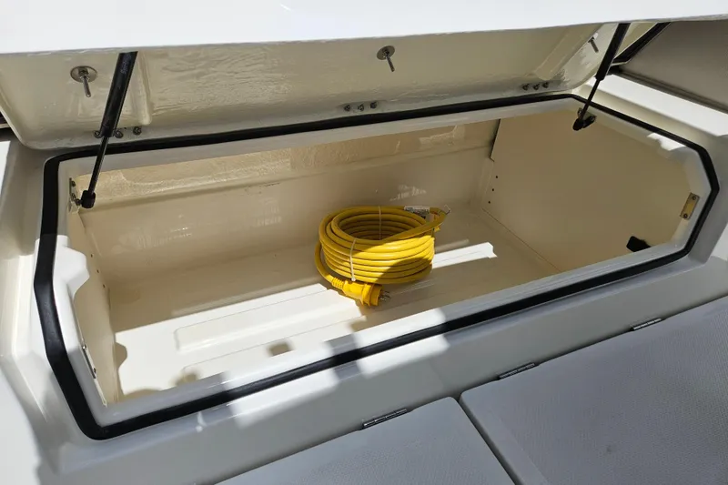 Slide: The Image of Open storage compartment in Navan S30 boat, year 2026. - 35