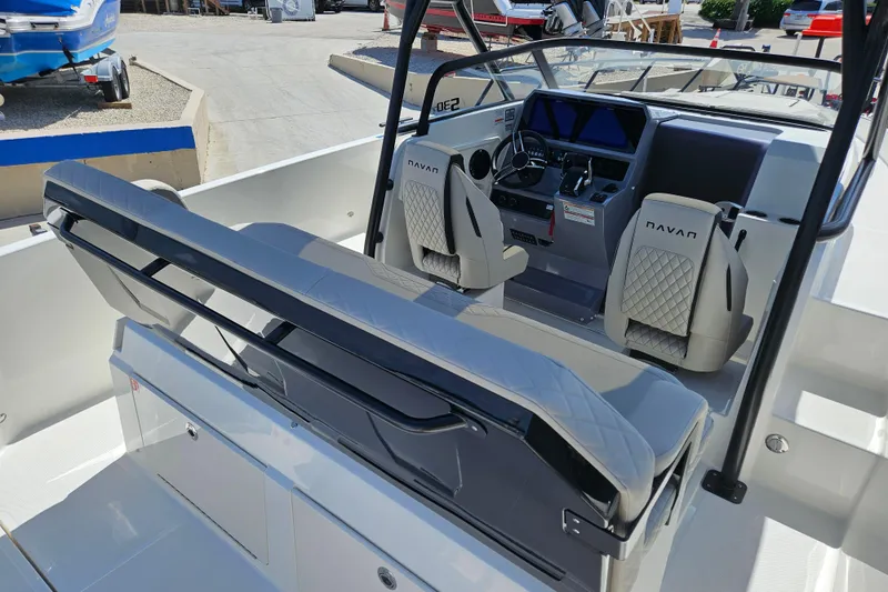 Slide: The Image of Interior of Navan S30 boat, 2026 model, featuring modern seats and control console. - 6