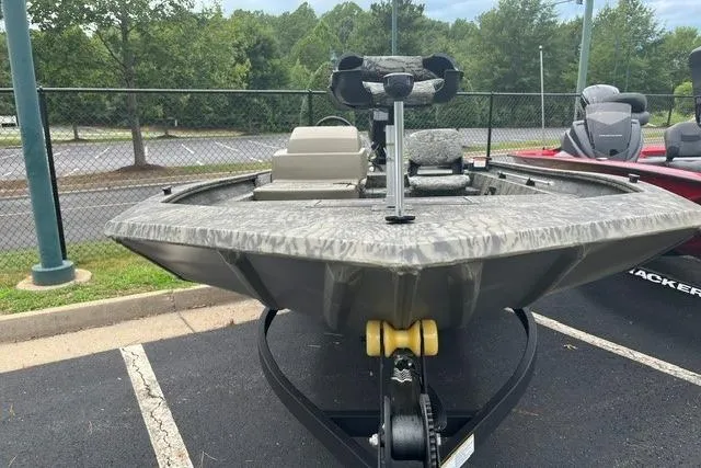 Slide: The Image of 2026 Tracker Grizzly 1754 SC boat on trailer, parked outdoors. - 2