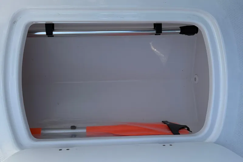 Slide: The Image of Storage compartment of 2026 Tahoe T16 boat, featuring a clean, spacious interior. - 31