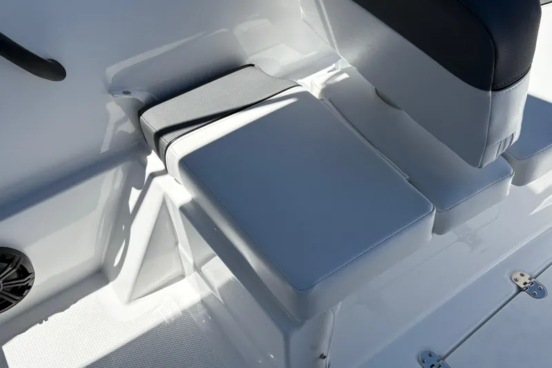 Slide: The Image of 2026 Tahoe T16 boat interior with cushioned seating and sleek design. - 30