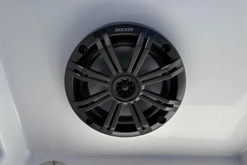Slide: The Image of Kicker speaker installed in a 2026 Tahoe T16 boat, featuring a sleek black design. - 29