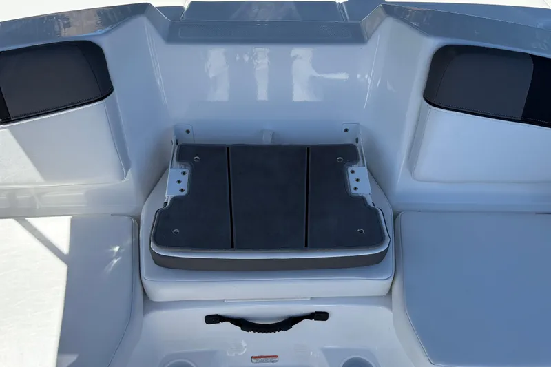 Slide: The Image of 2026 Tahoe T16 boat interior with sleek seating and storage compartment. - 21