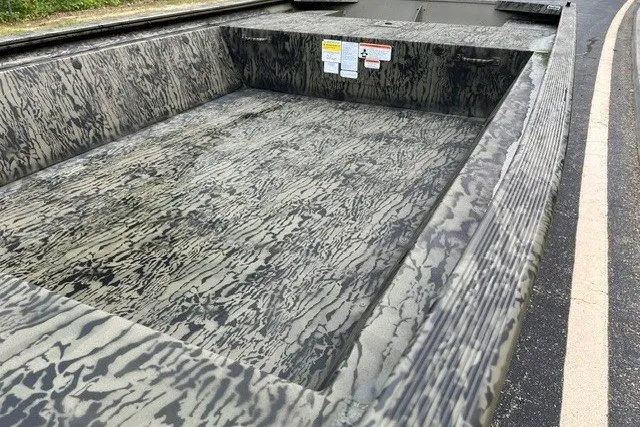 Slide: The Image of 2026 Tracker Grizzly 1648 Utility boat with camouflage interior design. - 13