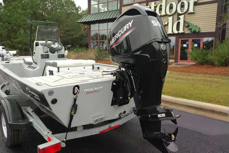 Slide: The Image of 2026 Tracker Bass Tracker Classic CC boat with Mercury engine outside Outdoor World. - 8