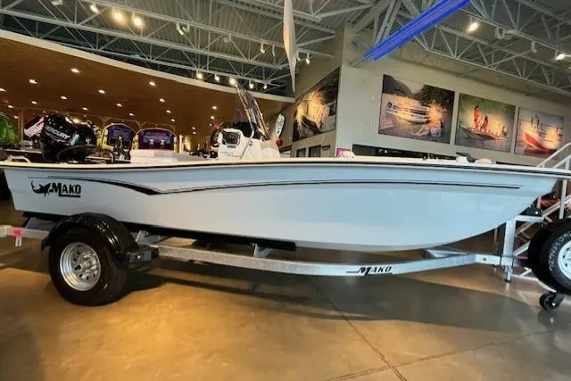 The Image of 2026 Mako Pro Skiff 15 CC boat displayed in a showroom. - 0