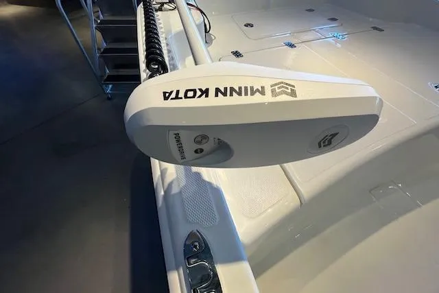 Slide: The Image of Minn Kota motor on 2026 Mako Pro Skiff 15 CC boat deck. - 3