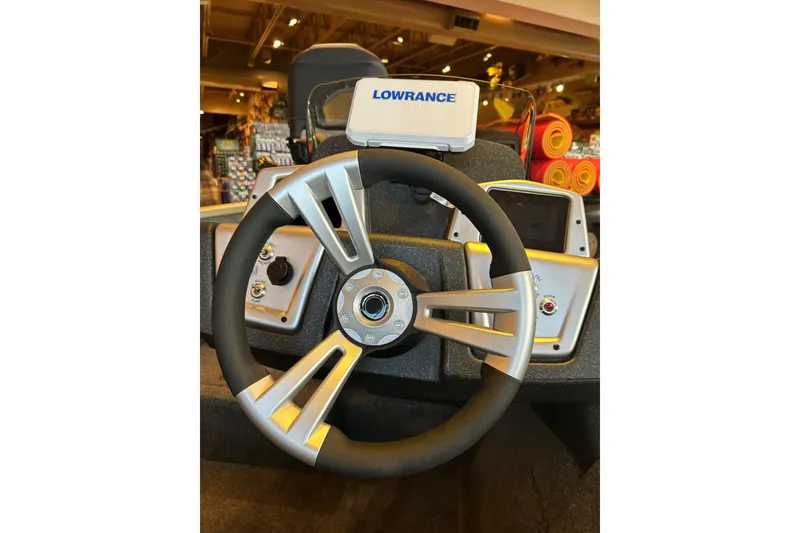 Slide: The Image of Steering wheel of 2026 Tracker Pro Team 190 boat with Lowrance device. - 4