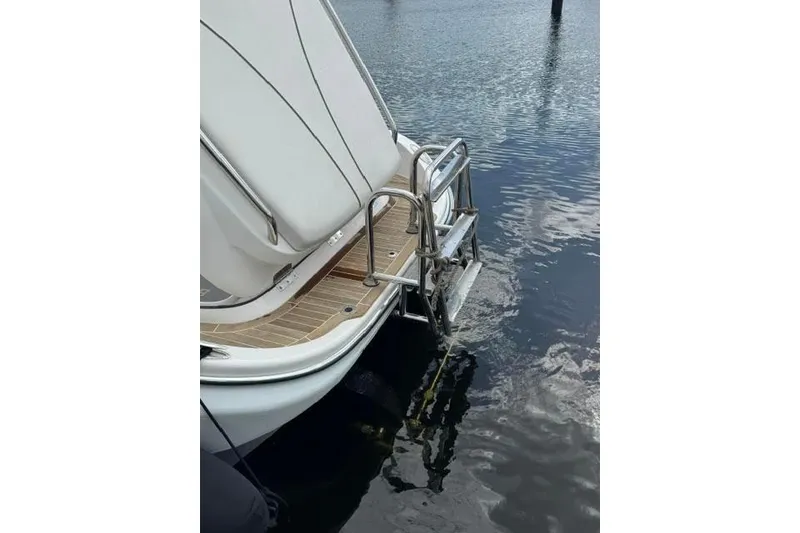 Slide: The Image of 2012 Novurania Chase boat with swim platform and ladder on calm water. - 3