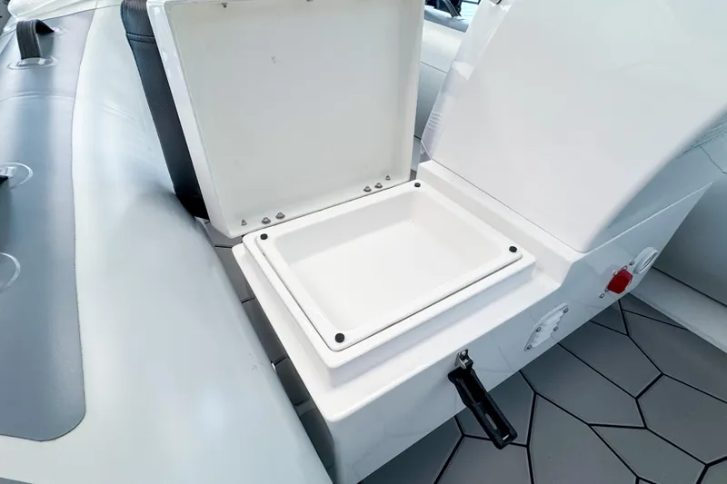 Slide: The Image of Interior view of 2026 Highfield Sport 360 boat with storage compartment. - 10