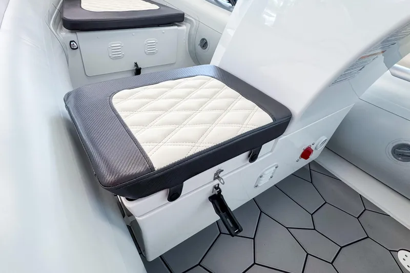 Slide: The Image of Interior of Highfield Sport 360 boat, seat cushion and flooring, model year 2026. - 9