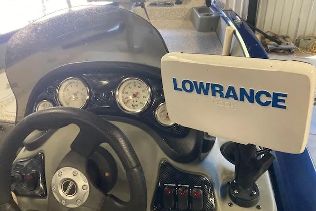 Slide: The Image of Bass Tracker Pro 17 boat dashboard with Lowrance fish finder, 2012 model. - 13