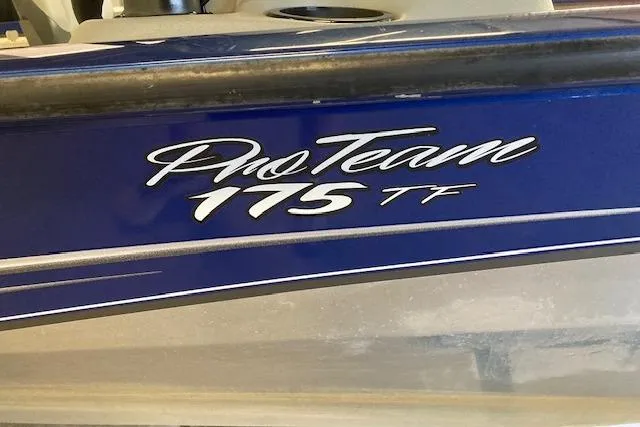 Slide: The Image of Bass Tracker Pro Team 175 TF boat, blue exterior, 2012 model. - 5