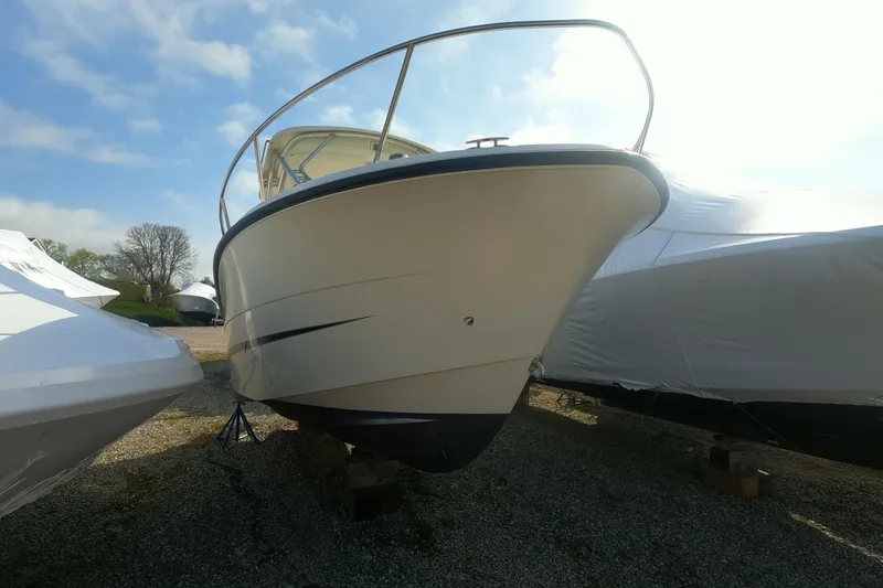 Slide: The Image of 2009 Hydra-Sports 2000 WA boat on dry dock under clear sky. - 11