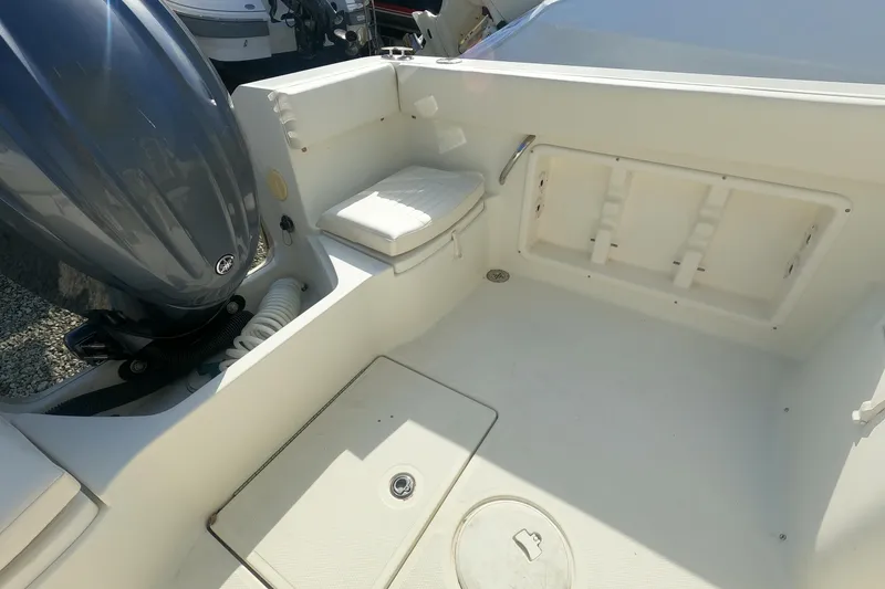 Slide: The Image of 2009 Hydra-Sports 2000 WA boat interior with seating and storage compartments. - 16
