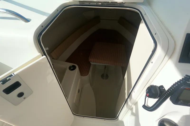 Slide: The Image of 2009 Hydra-Sports 2000 WA cabin interior with seating and table. - 20