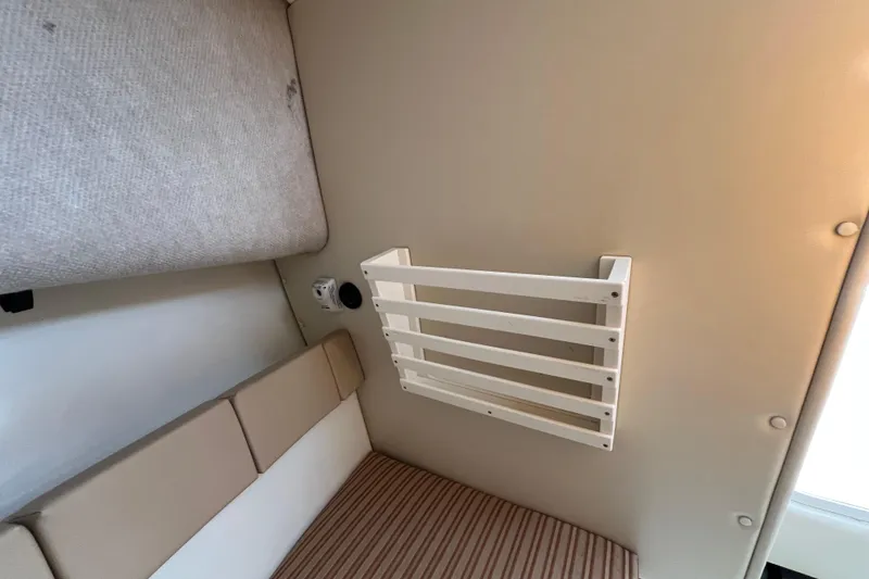 Slide: The Image of Interior cabin of 2009 Hydra-Sports 2000 WA boat with beige upholstery. - 28
