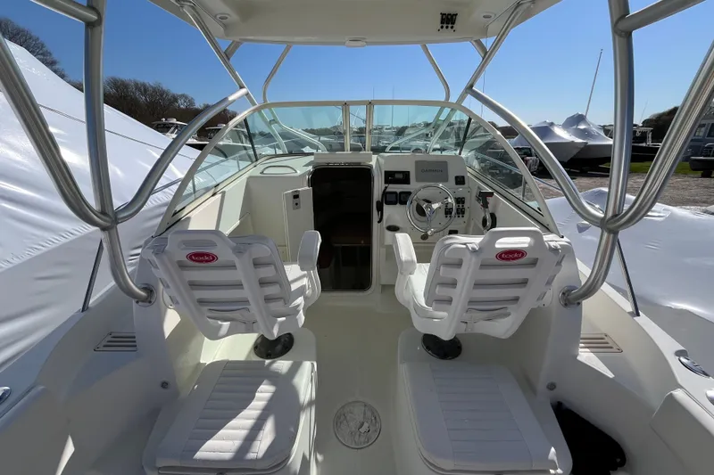 Slide: The Image of Interior view of 2009 Hydra-Sports 2000 WA boat cockpit with dual seats and steering console. - 32