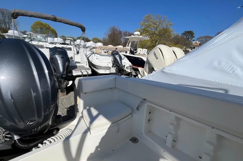 Slide: The Image of 2009 Hydra-Sports 2000 WA boat with Yamaha outboard engines, docked under clear blue sky. - 33