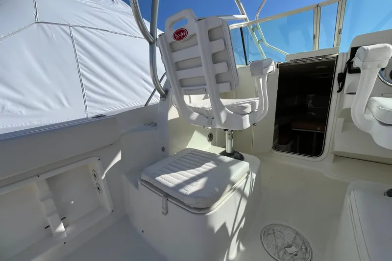 Slide: The Image of 2009 Hydra-Sports 2000 WA boat interior with white seating and cockpit view. - 37