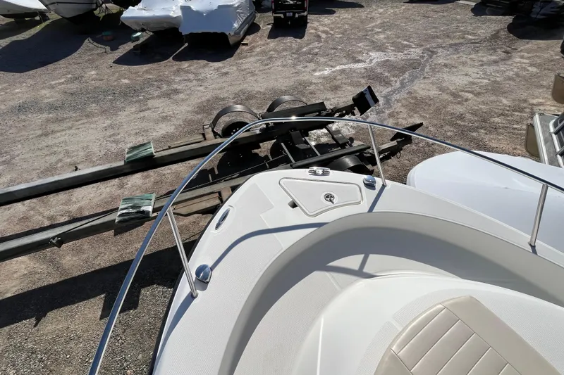 Slide: The Image of 2009 Hydra-Sports 2000 WA boat bow with trailer in a storage yard. - 39