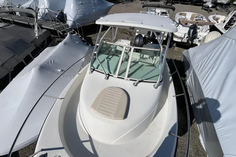 Slide: The Image of 2009 Hydra-Sports 2000 WA boat in storage, surrounded by covered vessels. - 40