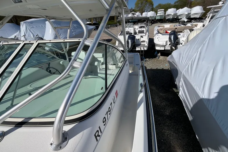 Slide: The Image of 2009 Hydra-Sports 2000 WA boat in storage, surrounded by other covered boats. - 43