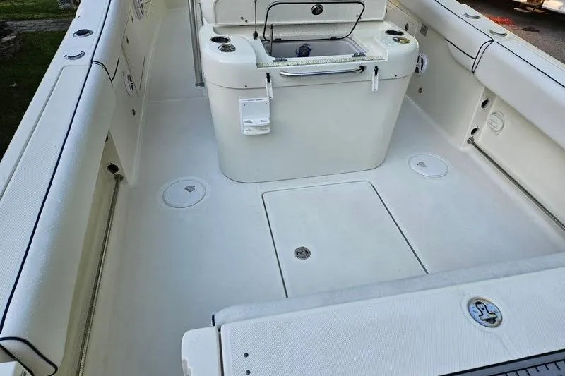 Slide: The Image of 2006 Hydra-Sports Vector 2900 CC boat interior with spacious deck and storage compartments. - 11