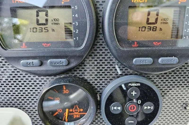 Slide: The Image of Dashboard of a 2006 Hydra-Sports Vector 2900 CC boat showing gauges and controls. - 16