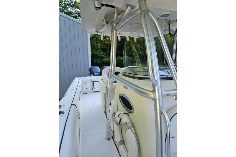 Slide: The Image of 2006 Hydra-Sports Vector 2900 CC boat interior with stainless steel railings and life preserver. - 32