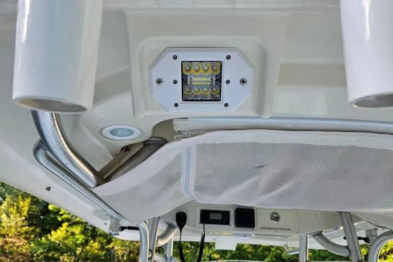 Slide: The Image of 2006 Hydra-Sports Vector 2900 CC boat interior with LED lighting and rod holders. - 36