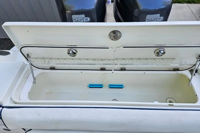 Slide: The Image of Open storage compartment on 2006 Hydra-Sports Vector 2900 CC boat with Yamaha engines. - 39