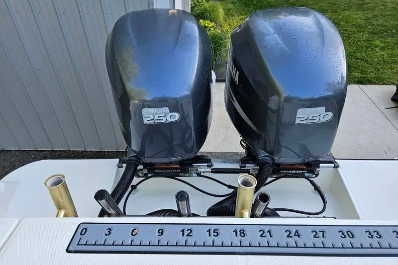 Slide: The Image of Twin Yamaha 250 outboard engines on a 2006 Hydra-Sports Vector 2900 CC boat. - 41