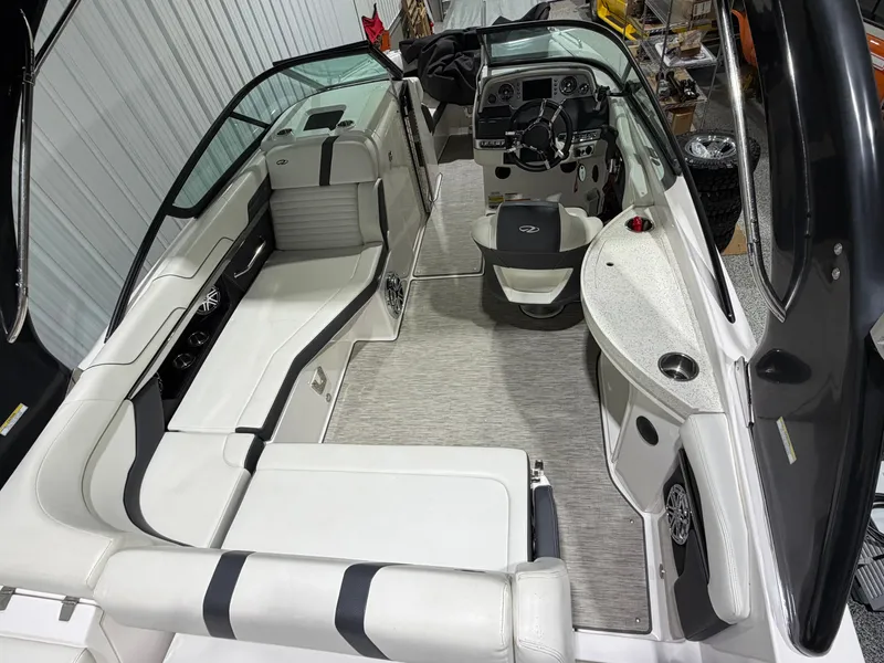 Slide: The Image of Interior of a 2016 Regal 24 FasDeck RX boat with white seating. - 12