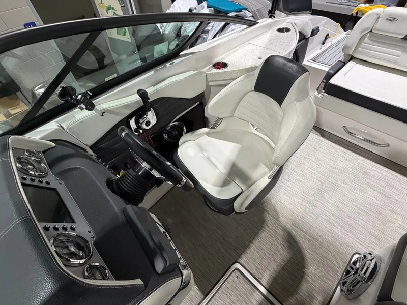 Slide: The Image of Interior of a 2016 Regal 24 FasDeck RX boat, modern cockpit design. - 14