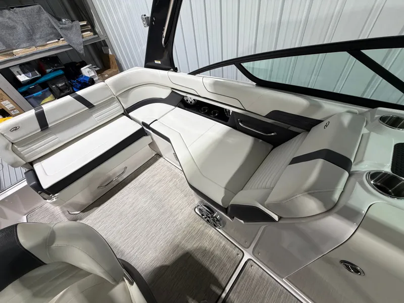 Slide: The Image of Interior of a 2016 Regal 24 FasDeck RX boat, white upholstery. - 15