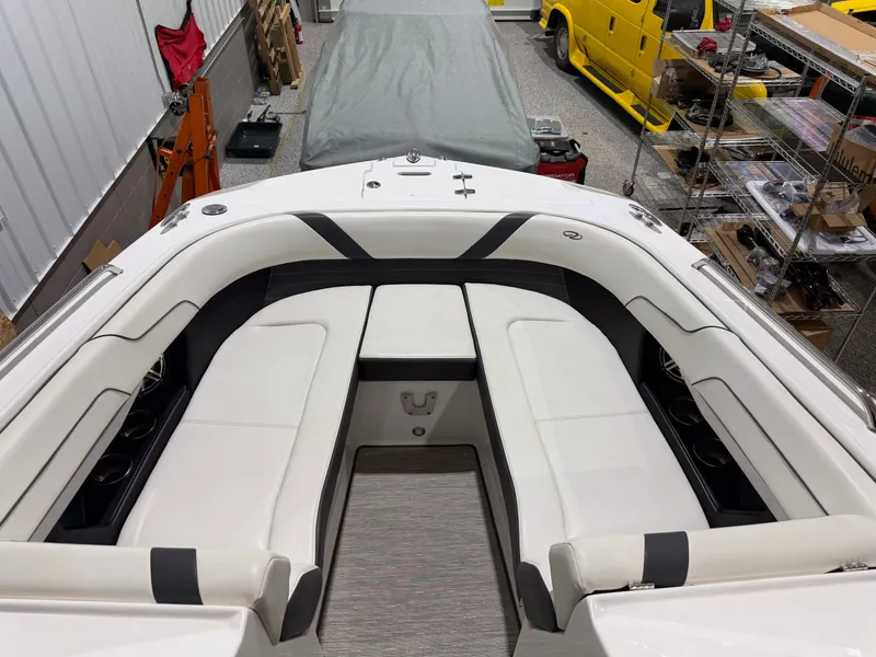 Slide: The Image of Interior of a 2016 Regal 24 FasDeck RX boat with white seating. - 23