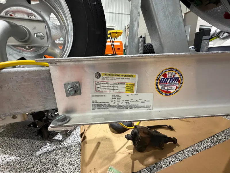 Slide: The Image of Trailer label and tire information on 2016 Regal 24 FasDeck RX. - 7