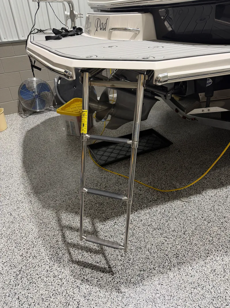 Slide: The Image of 2016 Regal 24 FasDeck RX with extended swim ladder. - 9