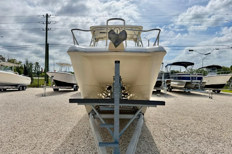 Slide: The Image of 2007 World Cat 250 DC boat on trailer in outdoor lot. - 2