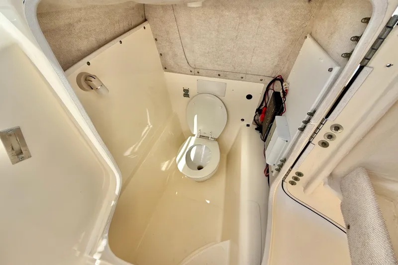 Slide: The Image of 2007 World Cat 250 DC boat interior with compact marine toilet. - 35