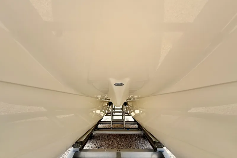 Slide: The Image of Underside view of a 2007 World Cat 250 DC boat on a trailer. - 37