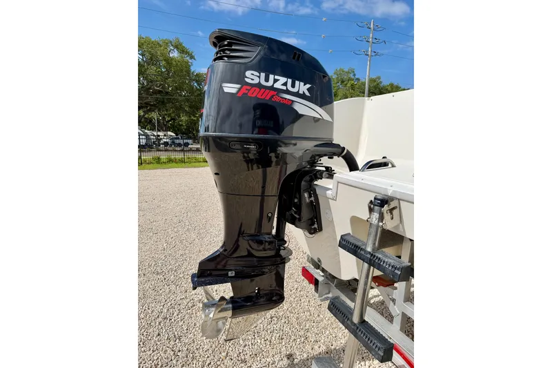 Slide: The Image of Suzuki Four Stroke outboard motor on 2007 World Cat 250 DC boat. - 42
