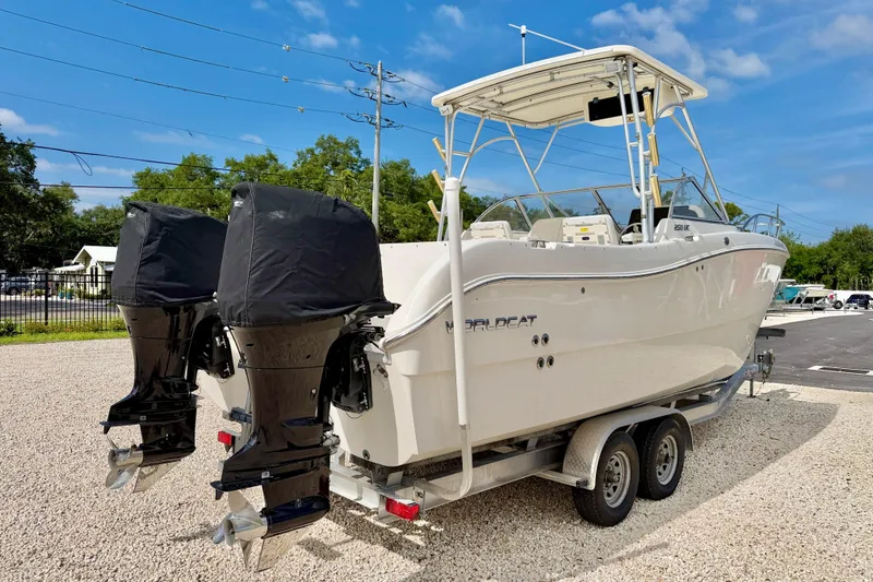 Slide: The Image of 2007 World Cat 250 DC boat on trailer with dual outboard motors. - 5